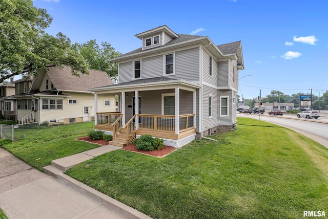 1647 37th St, Rock Island, IL 61201 - american foursquare style home featuring covered porch, a front lawn, and a shingled roof