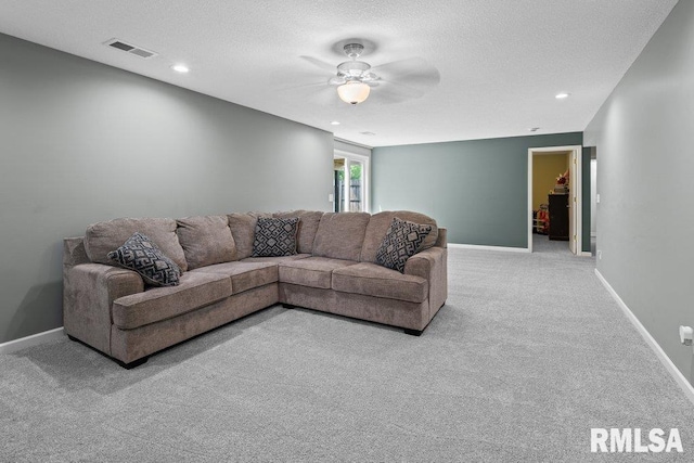 5300 Hillandale Rd, Davenport, IA 52806 - living room with carpet floors, ceiling fan, recessed lighting, and a textured ceiling