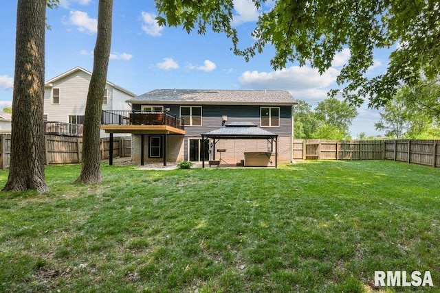 5300 Hillandale Rd, Davenport, IA 52806 - back of house with a gazebo, a fenced backyard, a patio area, and a deck