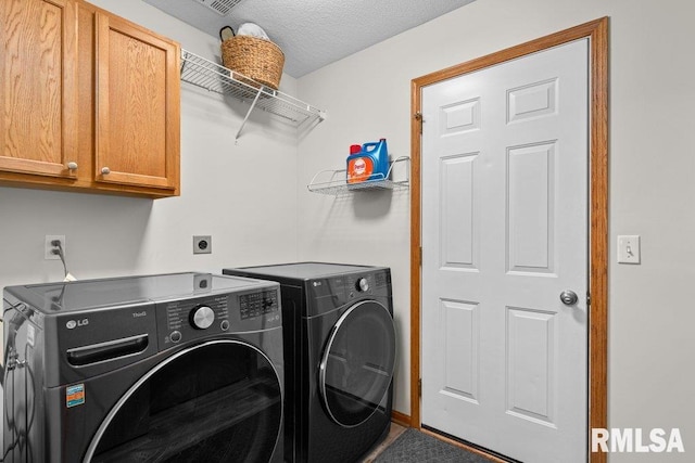 5300 Hillandale Rd, Davenport, IA 52806 - laundry area featuring washing machine and clothes dryer and cabinet space