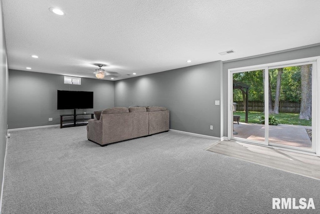 5300 Hillandale Rd, Davenport, IA 52806 - living area featuring recessed lighting, a textured ceiling, carpet flooring, and a ceiling fan
