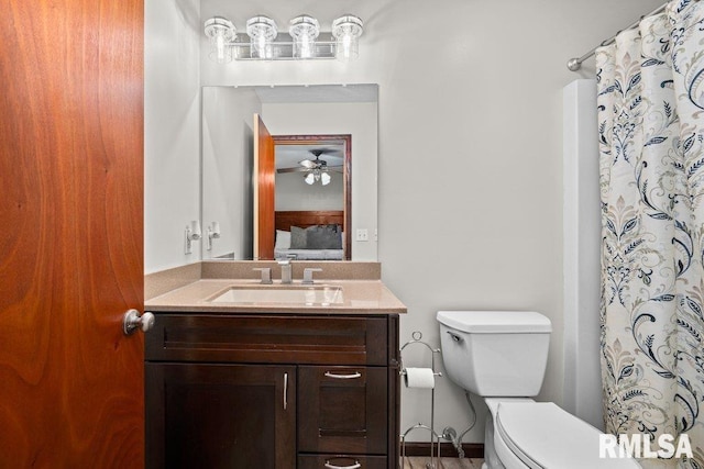 5300 Hillandale Rd, Davenport, IA 52806 - full bath featuring vanity, curtained shower, and a ceiling fan