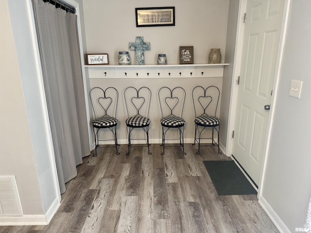 532 8th Ave S, Clinton, IA 52732 - dining room featuring wood finished floors and baseboards
