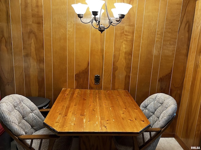 1210 Peterson Ave, Johnston City, IL 62951 - dining room featuring a chandelier and wood walls