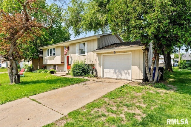 3110 N Pine St, Davenport, IA 52806 - raised ranch with a front lawn, an attached garage, and driveway