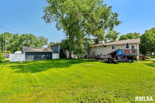 3110 N Pine St, Davenport, IA 52806 - view of green lawn with a wooden deck