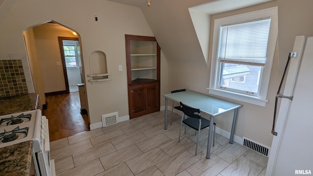 1522 Brady St, Davenport, IA 52803 - office space with arched walkways, baseboards, and vaulted ceiling