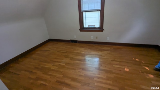 1522 Brady St, Davenport, IA 52803 - additional living space featuring wood finished floors and baseboards