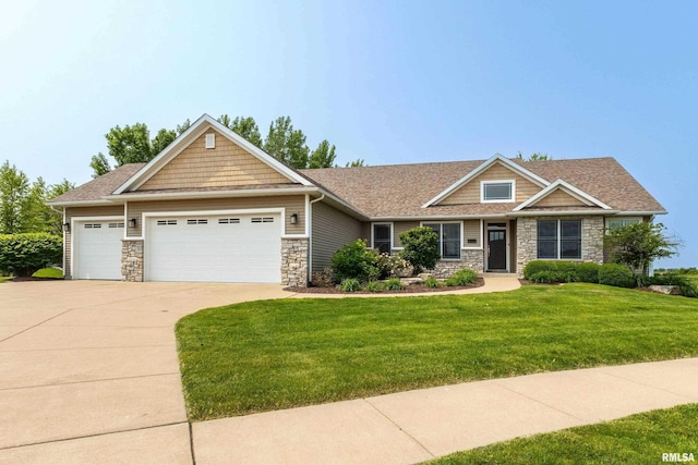 7 Redstone Ct, Le Claire, IA 52753 - craftsman-style house featuring stone siding, an attached garage, a front lawn, concrete driveway, and a shingled roof
