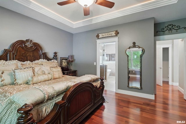 7 Redstone Ct, Le Claire, IA 52753 - bedroom featuring wood finished floors, a raised ceiling, ensuite bath, baseboards, and ceiling fan