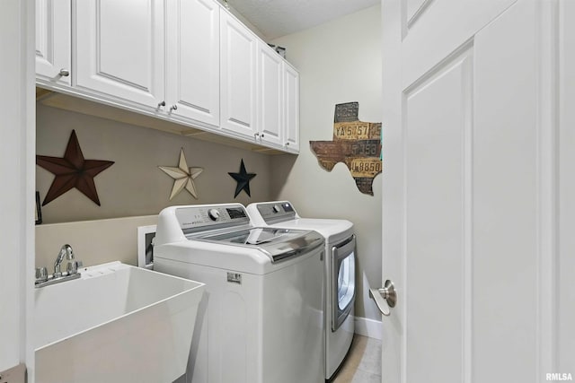 7 Redstone Ct, Le Claire, IA 52753 - washroom featuring cabinet space and washing machine and clothes dryer