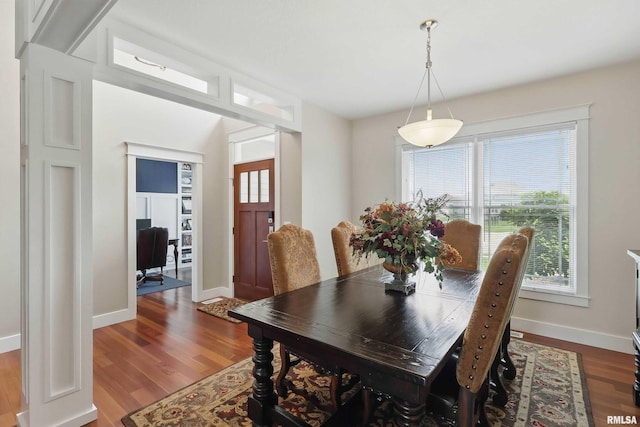 7 Redstone Ct, Le Claire, IA 52753 - dining room with dark wood finished floors and baseboards