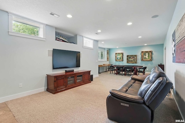 7 Redstone Ct, Le Claire, IA 52753 - living area featuring recessed lighting, carpet flooring, plenty of natural light, and baseboards