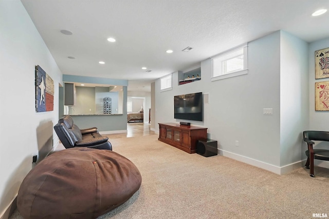 7 Redstone Ct, Le Claire, IA 52753 - living room featuring light carpet, recessed lighting, and baseboards