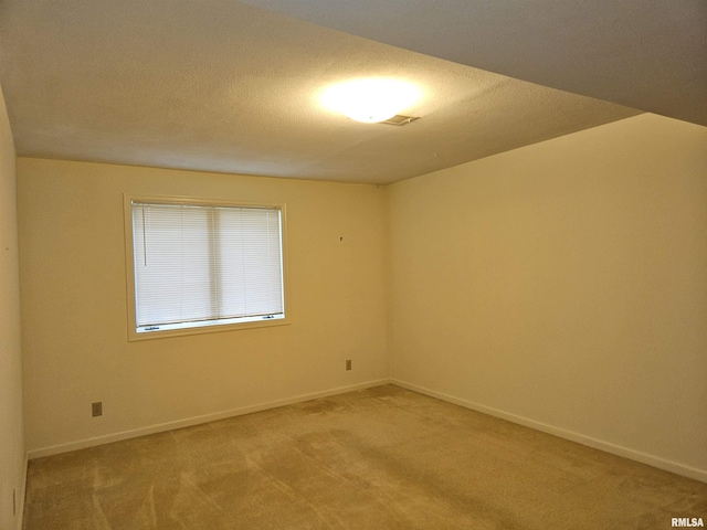 2120 Fareway Dr, Muscatine, IA 52761 - unfurnished room featuring light carpet and baseboards