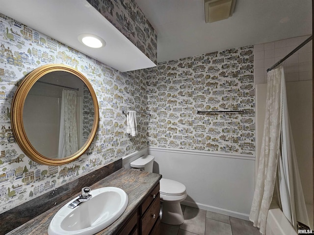 2120 Fareway Dr, Muscatine, IA 52761 - full bathroom featuring wallpapered walls, vanity, toilet, wainscoting, and tile patterned flooring