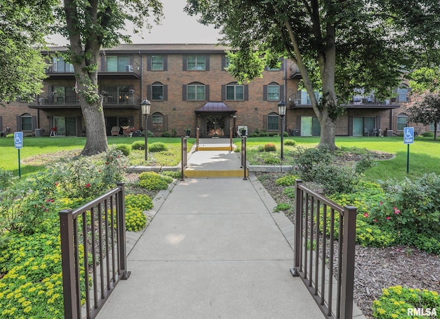 1360 Kimberly Ridge Rd Unit 313, Bettendorf, IA 52722 - view of home's community featuring a lawn