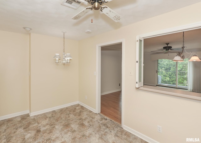 1360 Kimberly Ridge Rd Unit 313, Bettendorf, IA 52722 - empty room featuring a ceiling fan and a smoke detector