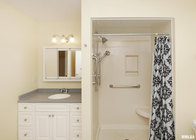 1360 Kimberly Ridge Rd Unit 313, Bettendorf, IA 52722 - bathroom with a shower with curtain and vanity