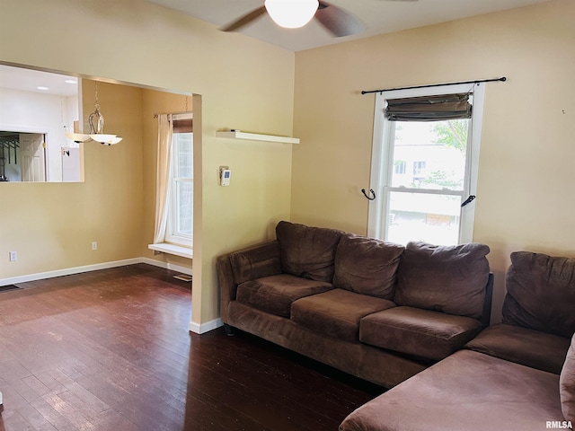210 SE Front St, Dongola, IL 62926 - living room featuring wood-type flooring, ceiling fan, and baseboards