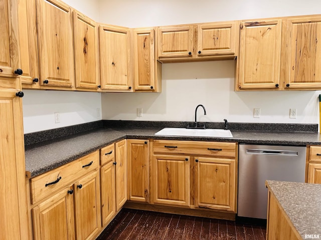 210 SE Front St, Dongola, IL 62926 - kitchen with a sink, stainless steel dishwasher, dark countertops, and dark wood-style floors