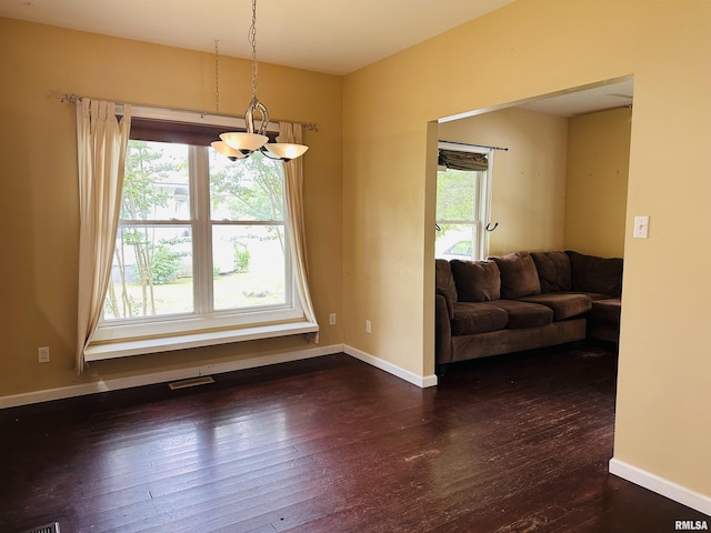 210 SE Front St, Dongola, IL 62926 - dining space featuring dark wood-style flooring and baseboards