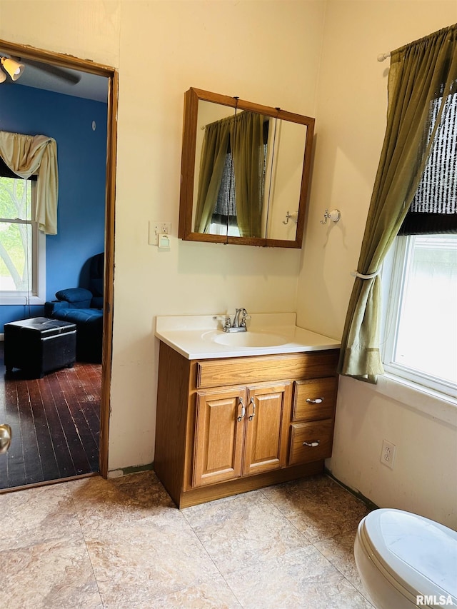 210 SE Front St, Dongola, IL 62926 - bathroom featuring vanity and toilet