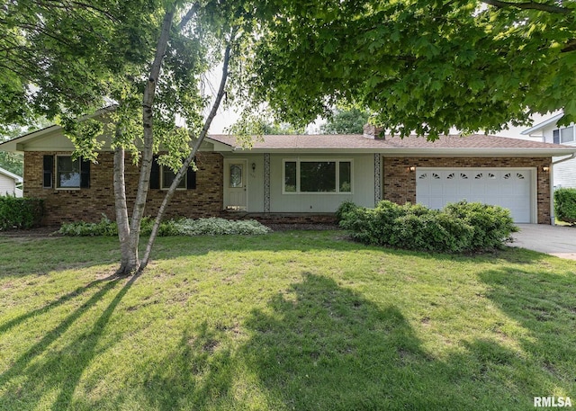 1523 7th St, Orion, IL 61273 - view of front of house with an attached garage, brick siding, a front lawn, driveway, and a chimney