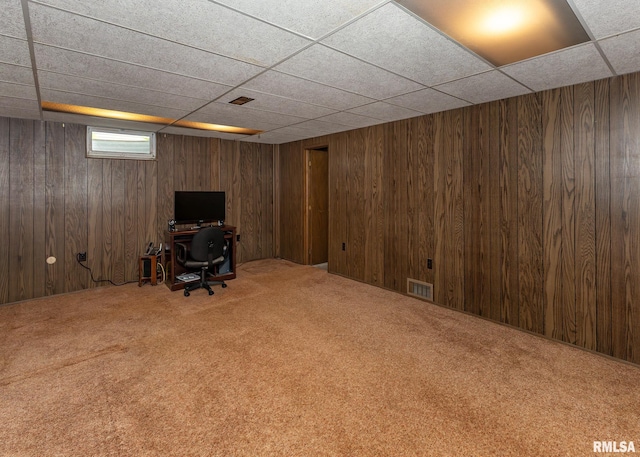 1523 7th St, Orion, IL 61273 - basement featuring a paneled ceiling, carpet floors, a desk, and wooden walls