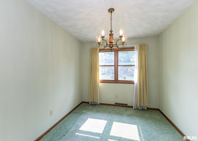 1523 7th St, Orion, IL 61273 - unfurnished room with a chandelier, carpet floors, and baseboards