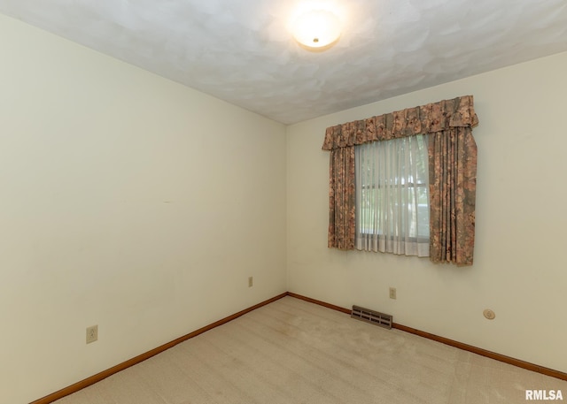 1523 7th St, Orion, IL 61273 - empty room with baseboards and carpet floors