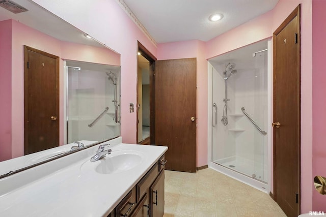 803 Locust St, Princeton, IA 52768 - bathroom with a shower stall and vanity