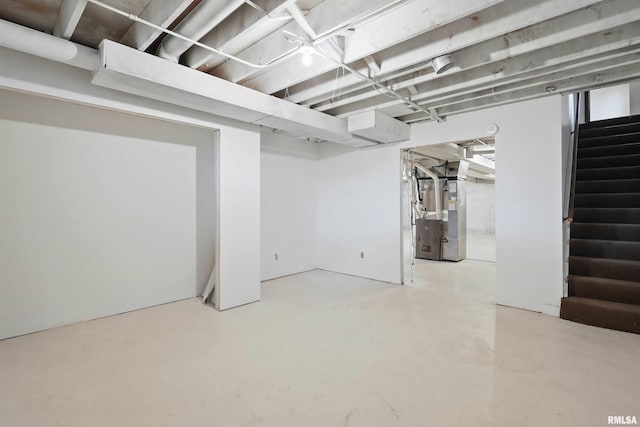 803 Locust St, Princeton, IA 52768 - finished basement featuring heating unit and stairway