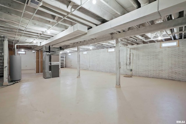 803 Locust St, Princeton, IA 52768 - basement featuring water heater and heating unit