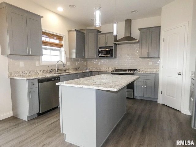 11401 N Joseph St, Dunlap, IL 61525 - kitchen featuring appliances with stainless steel finishes, wall chimney exhaust hood, gray cabinetry, and recessed lighting
