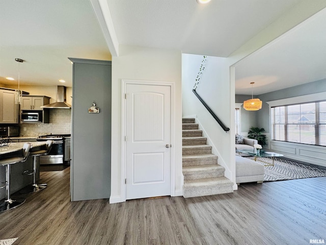 11401 N Joseph St, Dunlap, IL 61525 - stairway with wood finished floors and recessed lighting