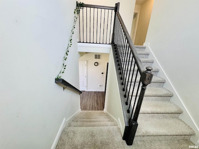 11401 N Joseph St, Dunlap, IL 61525 - staircase with baseboards and carpet flooring