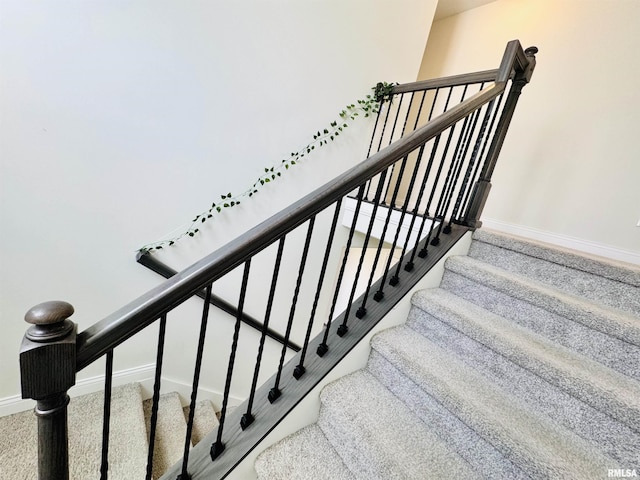 11401 N Joseph St, Dunlap, IL 61525 - staircase featuring baseboards and carpet