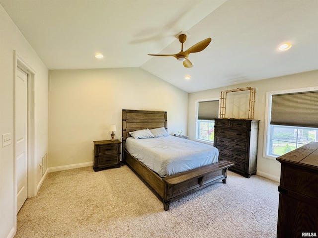 11401 N Joseph St, Dunlap, IL 61525 - bedroom with light colored carpet, multiple windows, vaulted ceiling, a ceiling fan, and recessed lighting