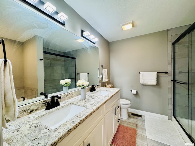 11401 N Joseph St, Dunlap, IL 61525 - bathroom featuring double vanity and a shower stall