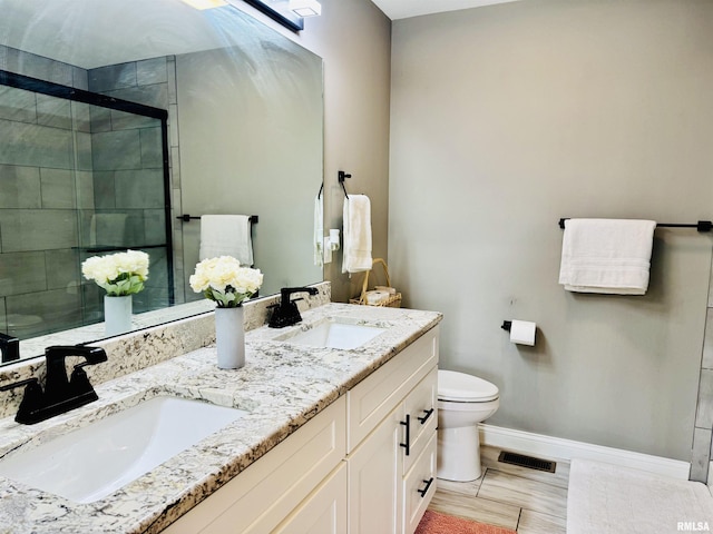 11401 N Joseph St, Dunlap, IL 61525 - bathroom featuring double vanity and a shower stall
