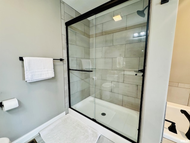 11401 N Joseph St, Dunlap, IL 61525 - bathroom featuring a stall shower and a bath