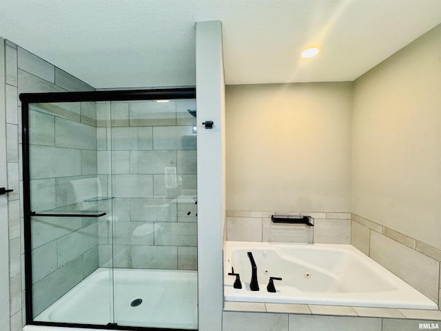 11401 N Joseph St, Dunlap, IL 61525 - bathroom featuring a whirlpool tub, a stall shower, and recessed lighting