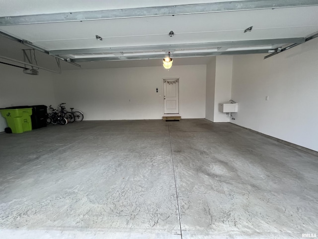 11401 N Joseph St, Dunlap, IL 61525 - garage featuring a garage door opener
