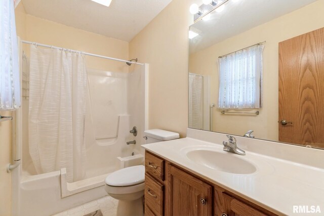1530 N Pine St, Davenport, IA 52804 - bathroom featuring toilet, vanity, shower / bath combination with curtain, and tile patterned floors