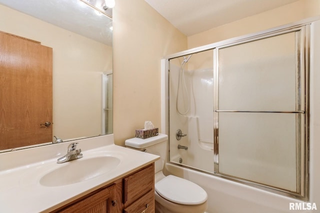 1530 N Pine St, Davenport, IA 52804 - bathroom with toilet, vanity, and shower / bath combination with glass door