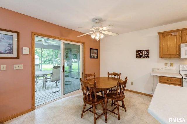 1530 N Pine St, Davenport, IA 52804 - dining space featuring ceiling fan and baseboards