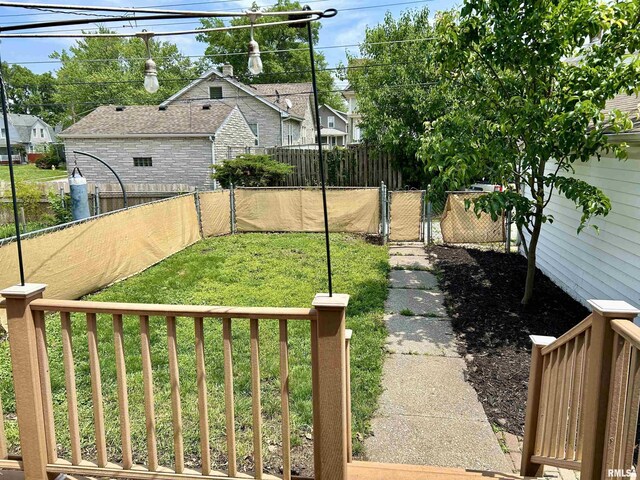2723 Iowa St, Davenport, IA 52803 - view of yard featuring a gate