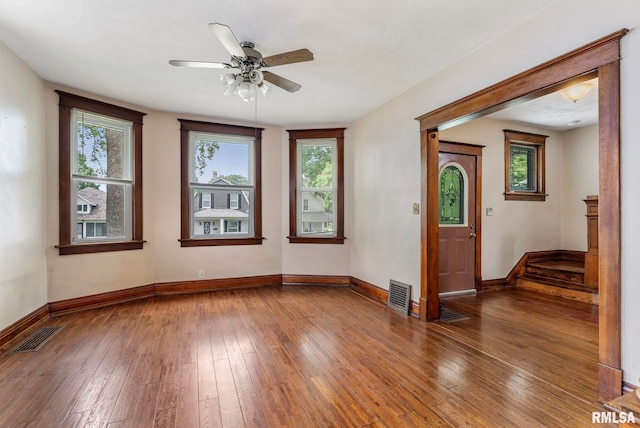 2723 Iowa St, Davenport, IA 52803 - unfurnished room with hardwood / wood-style floors, baseboards, and plenty of natural light