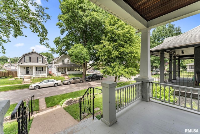 2723 Iowa St, Davenport, IA 52803 - covered porch with a lawn